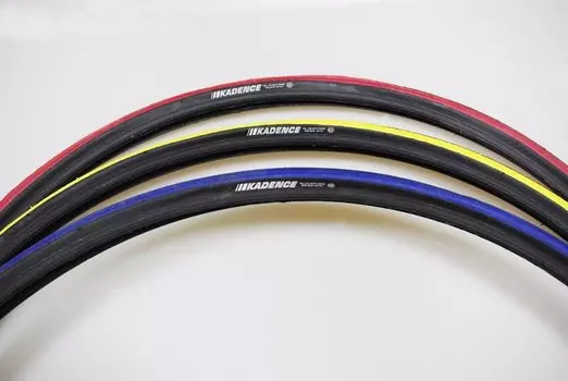 Покрышка велосипедная KENDA клинчер K-1081 KADENCE (700х23С), черно-желтый