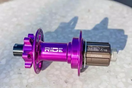 Втулка задняя RIDE Boost 28h 12x148 Anti Bite Purple, BX211RPUR28