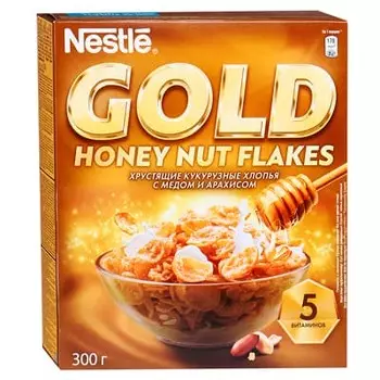 Хлопья Nestle Gold Flakes хрустящие кукурузные с медом и арахисом 300 гр
