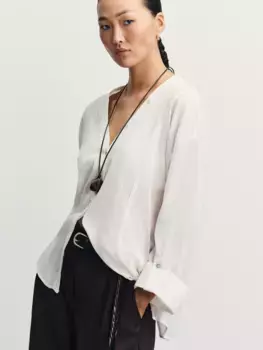 Блуза свободного кроя с разрезами