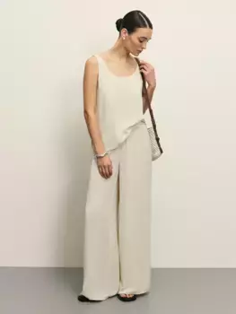 Брюки-палаццо с эластичным поясом из жатой ткани