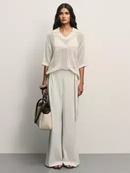 Брюки с защипами