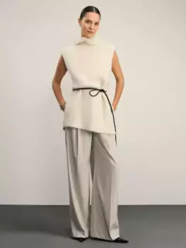 Широкие брюки с защипами