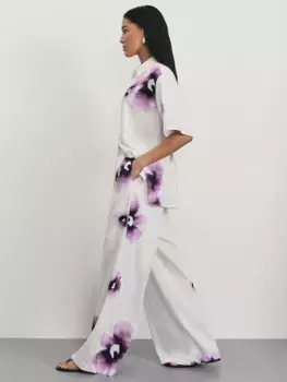 Широкие брюки с цветочным принтом