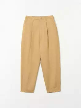 Брюки фасона Carrot с защипами