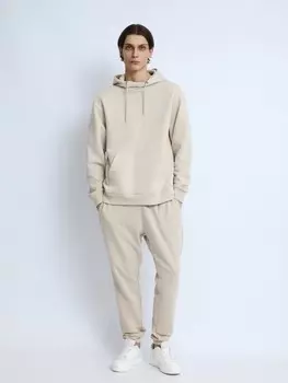 Трикотажные брюки-джоггеры в спортивном стиле