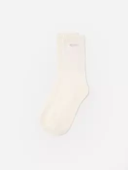 Высокие носки с резинкой в рубчик