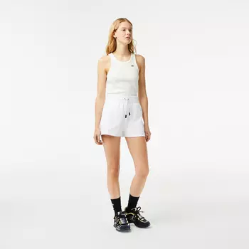 Женские однотонные шорты Lacoste