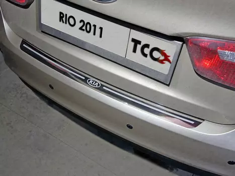 Накладка на задний бампер (лист зеркальный надпись RIO) Компания ТСС KIARIO11-11 KIA Rio III 2011 - 2014