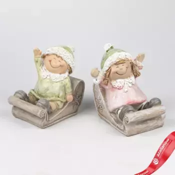 Сувенир Мальчик/Девочка на санках (полирезин), Н9х9х7,8см, в асс., зеленый/розовый