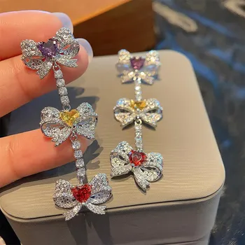 Легкие роскошные серьги с кисточками и бантом, длинные серьги Love Zircon, женские темпераментные популярные ювелирные изделия розовый