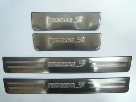 Накладки на дверные пороги с логотипом (нержавеющая сталь) JMT 24499 Mazda 3 2009 - 2012