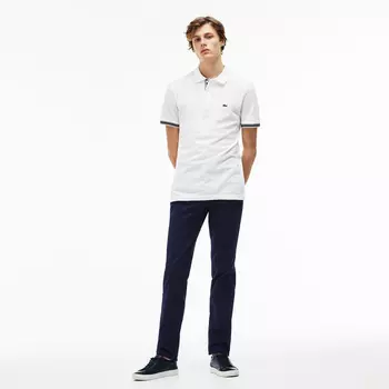 Джинсы Lacoste