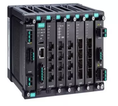 Коммутатор управляемый MOXA MDS-G4020 модульный 4 встроенных порта 10/100/1000 BaseT(X) Ethernet, 2 слота для модулей питания