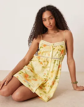 ASOS DESIGN мини-платье на бретелях с пуговицами и принтом в стиле пэчворк с цветочным принтом