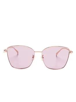 Gucci Eyewear солнцезащитные очки в оправе 'бабочка', розовый
