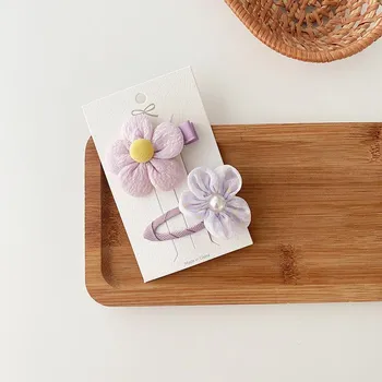 2 purple bowknot hair clips, perfect for Korean-style young girls, versatile for youthful bangs and hair accessories.